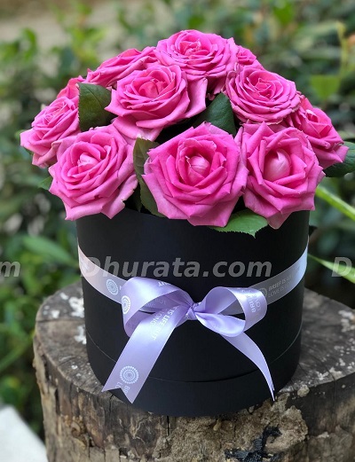 15 pink roses in a box